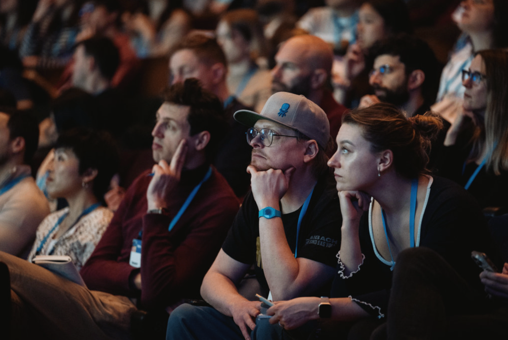 Audience focused on a conference talk